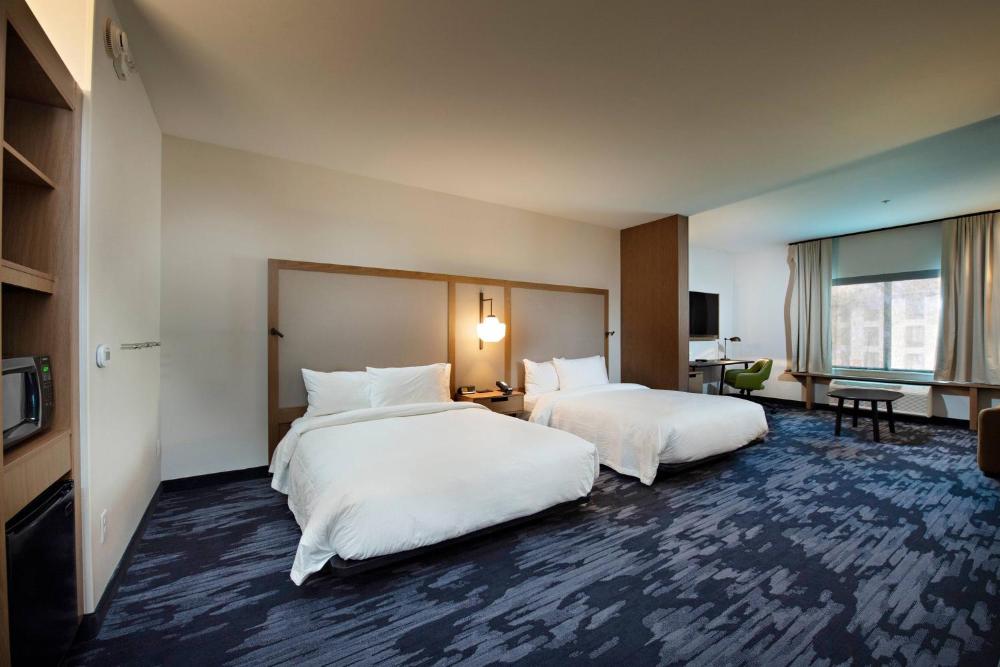 Queen Suite with Two Queen Beds and Sofa Bed - Communication Assistance interior